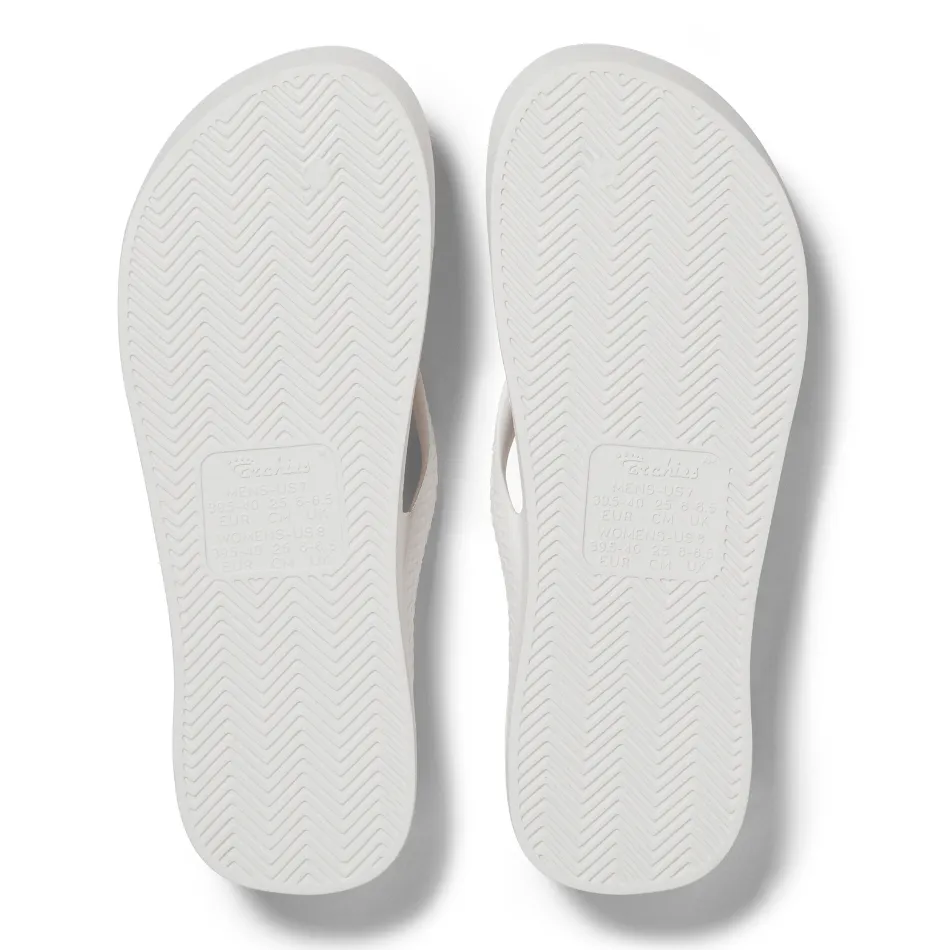 dirt running Archies Arch Support Flip Flops in White