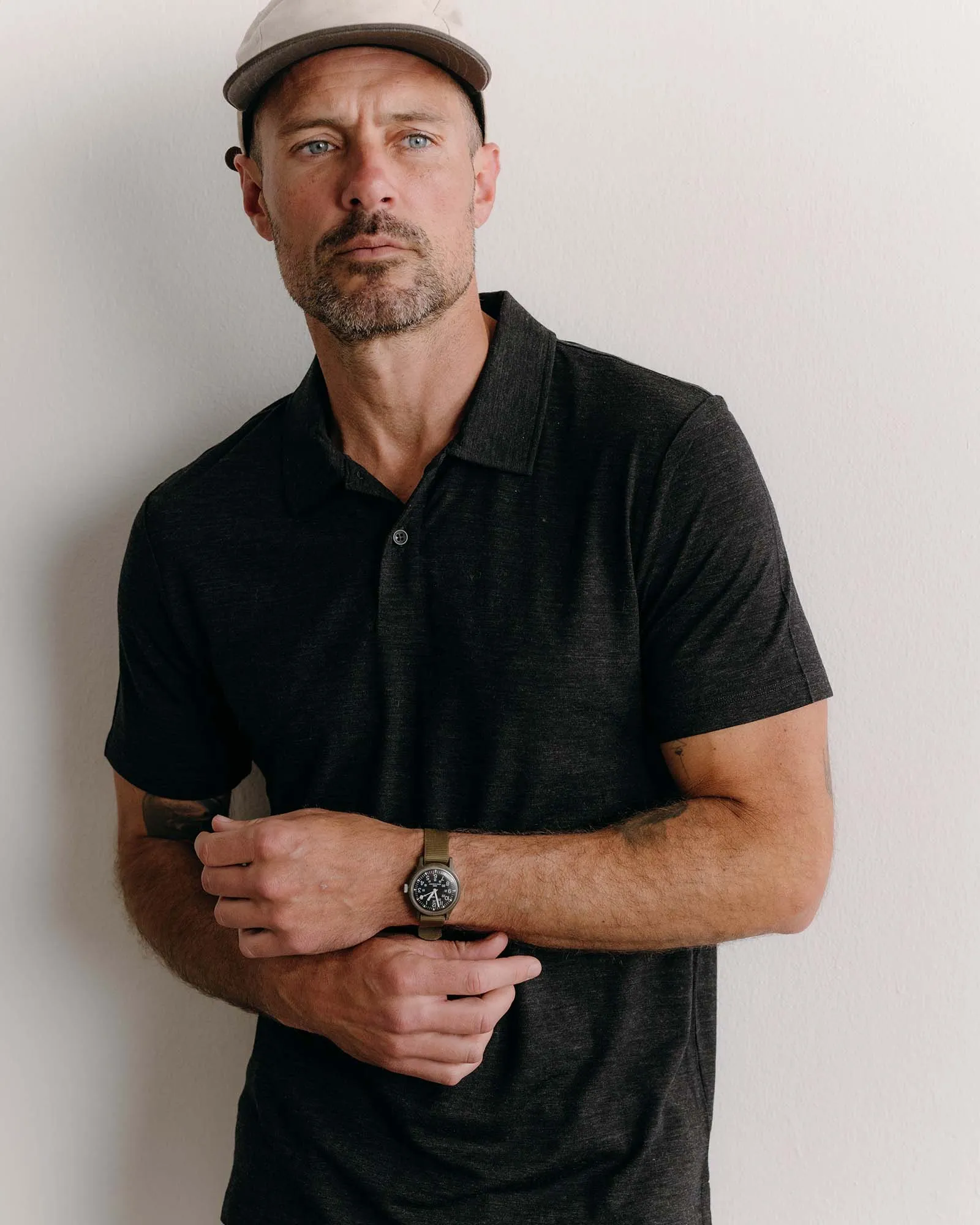 The Merino Polo in Heather Black Versatile and Comfortable Recycled Polyester