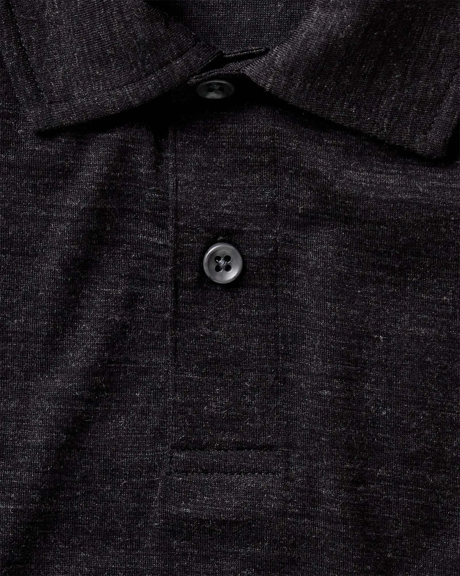 Minimalist purity The Merino Polo in Heather Black