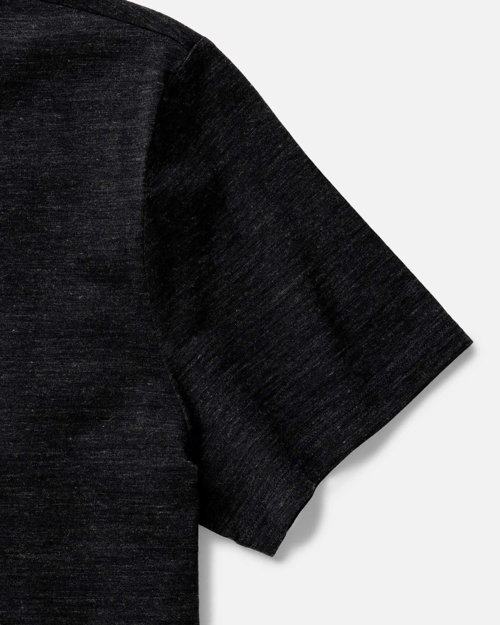 The Merino Tee in Heather Black Cozy Vibe Wear Abstract mystery