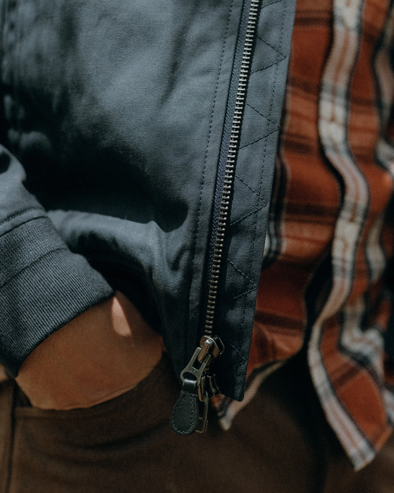 The Insulated Bomber Jacket in Dark Navy Dry Wax Storm Proof Mousse